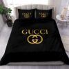 Gucci Golden Logo In Black Background Bedding Set